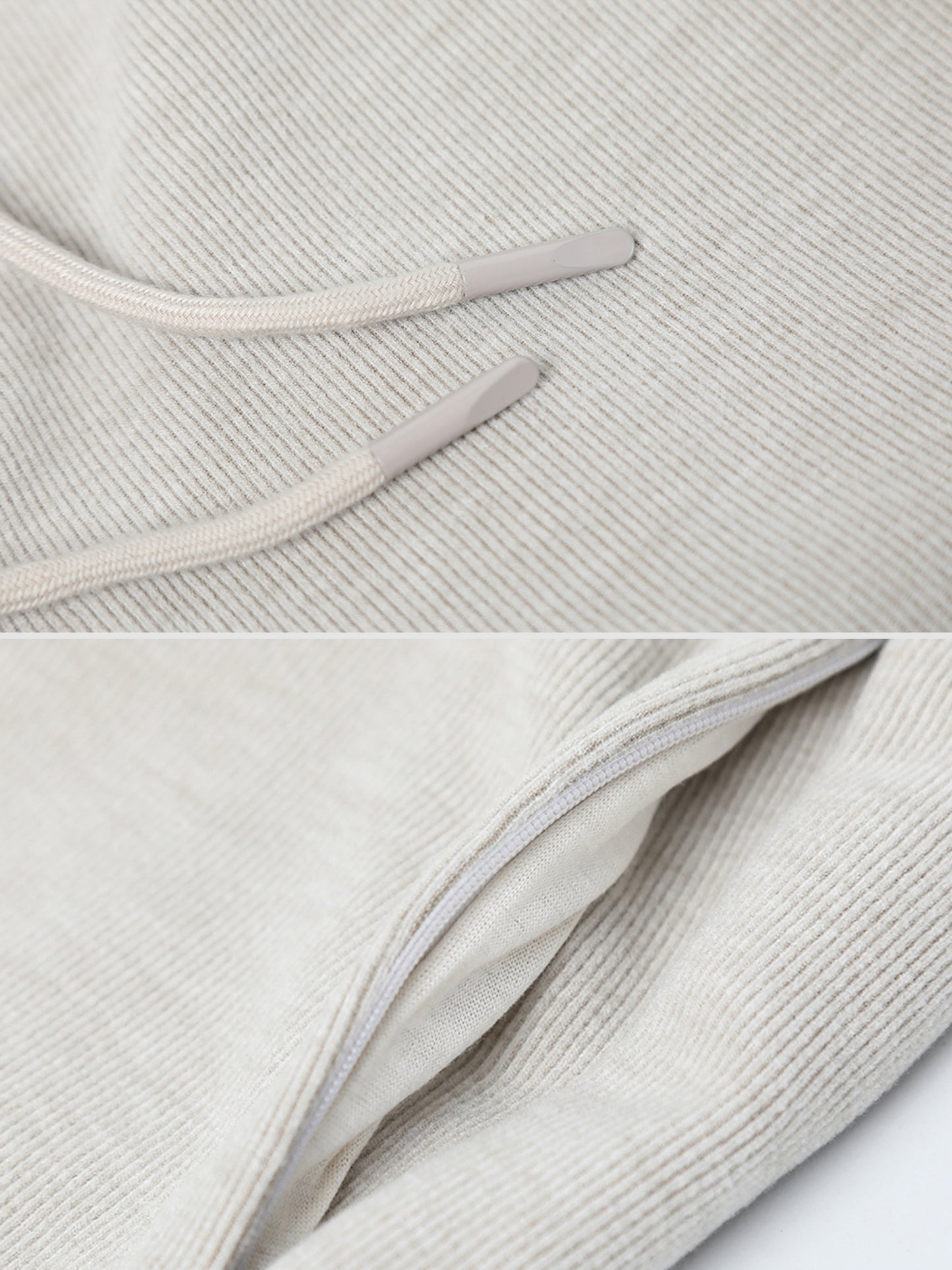 Close-up of Arkin Studio drawstring high waist sport shorts in light gray, focusing on the two drawstrings and the pocket opening