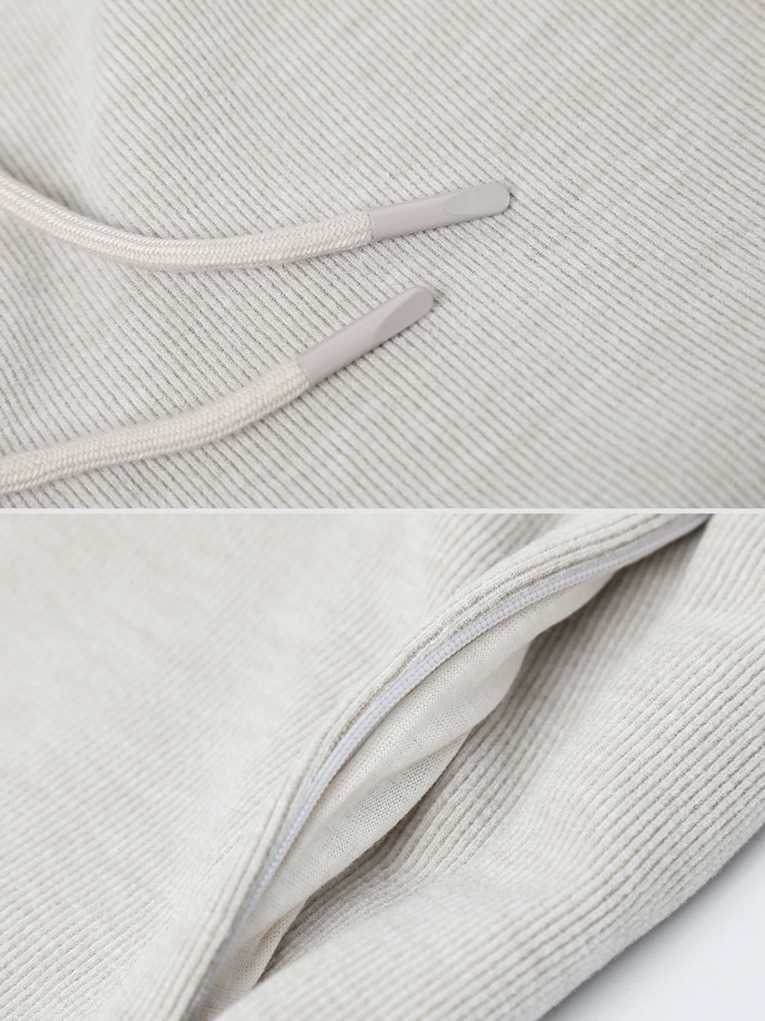 Close-up of Arkin Studio drawstring high waist sport shorts in light gray, focusing on the two drawstrings and the pocket opening