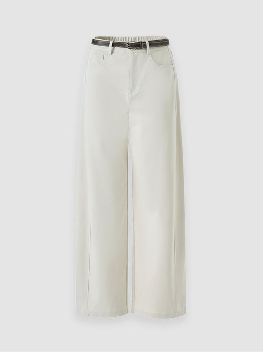 Arkin Studio high rise curved leg trousers in ivory, with a brown belt, main view on a white background