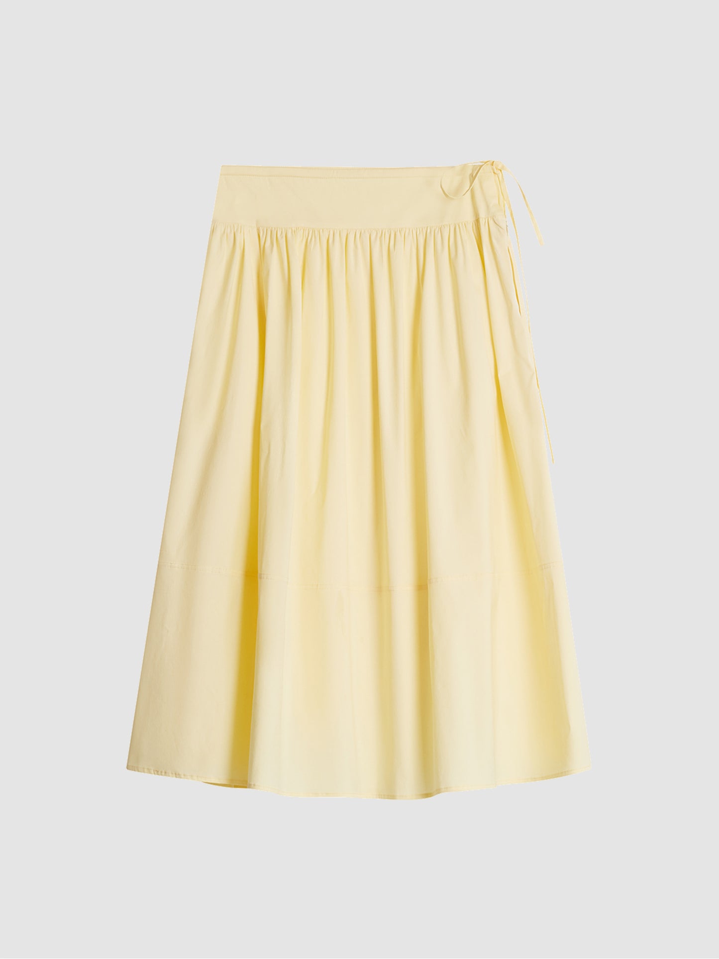 Arkin Studio lightweight pleated a-line drawstring skirt in light yellow, main view on white background