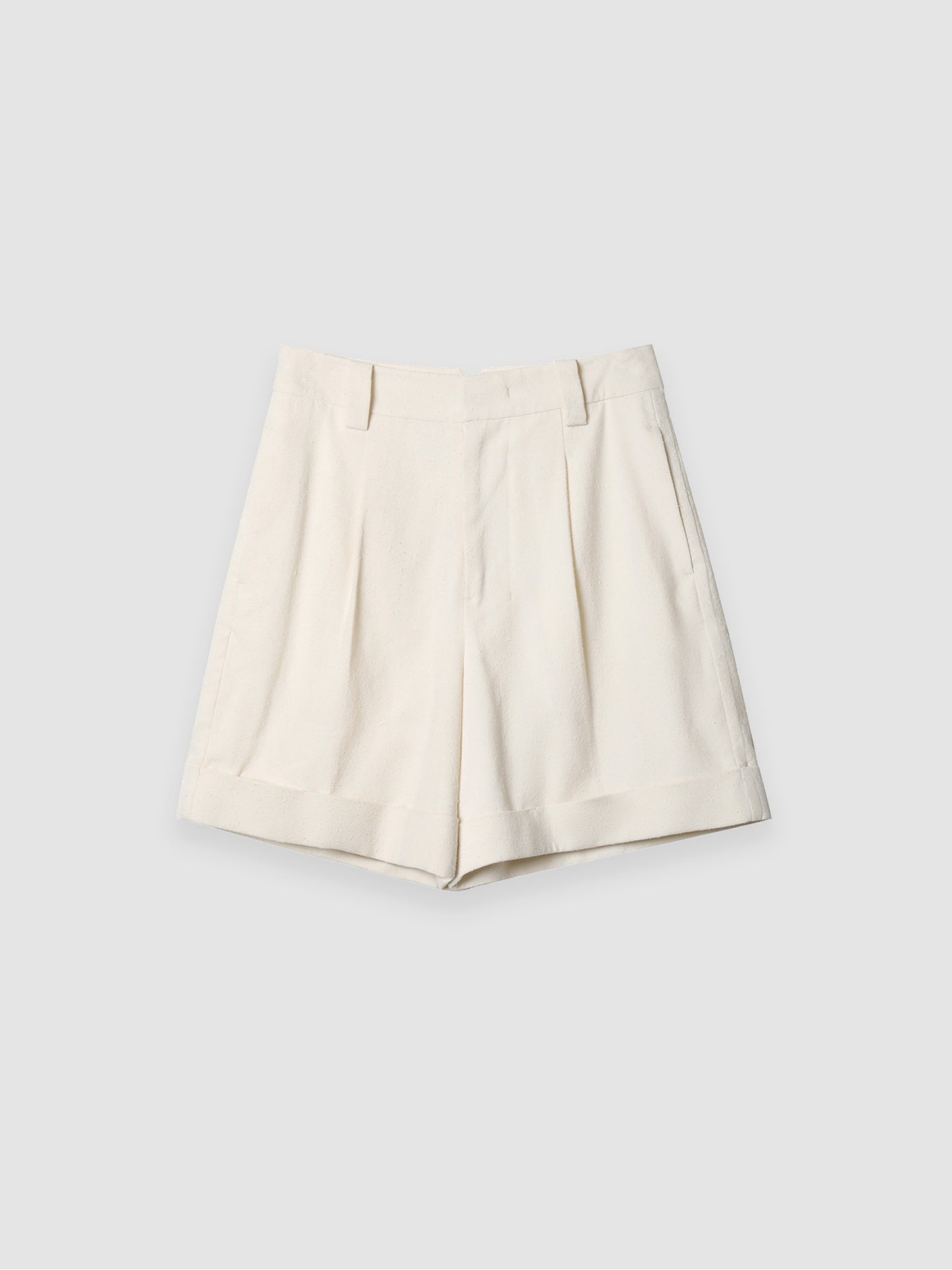 Arkin Studio minimalist cuffed a-line shorts in ivory, main view on a white background
