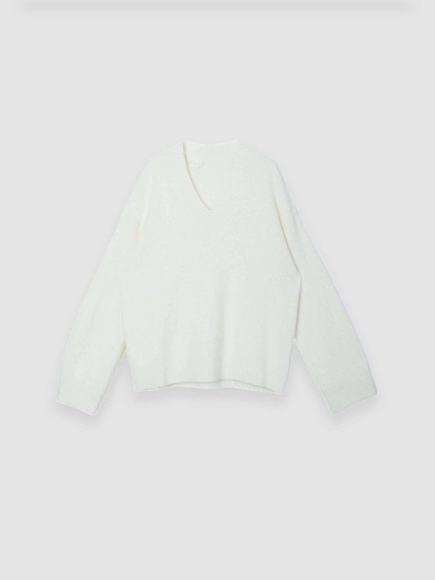 Arkin Studio oversized v-neck fuzzy sweater in white, main view on a white background
