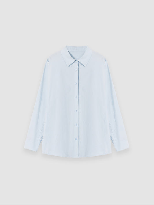 Arkin Studio relaxed blue tencel cotton blouse in light blue, main view on white background